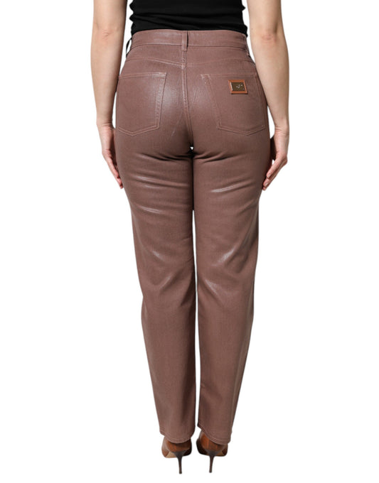 Woman wearing brown leather pants
