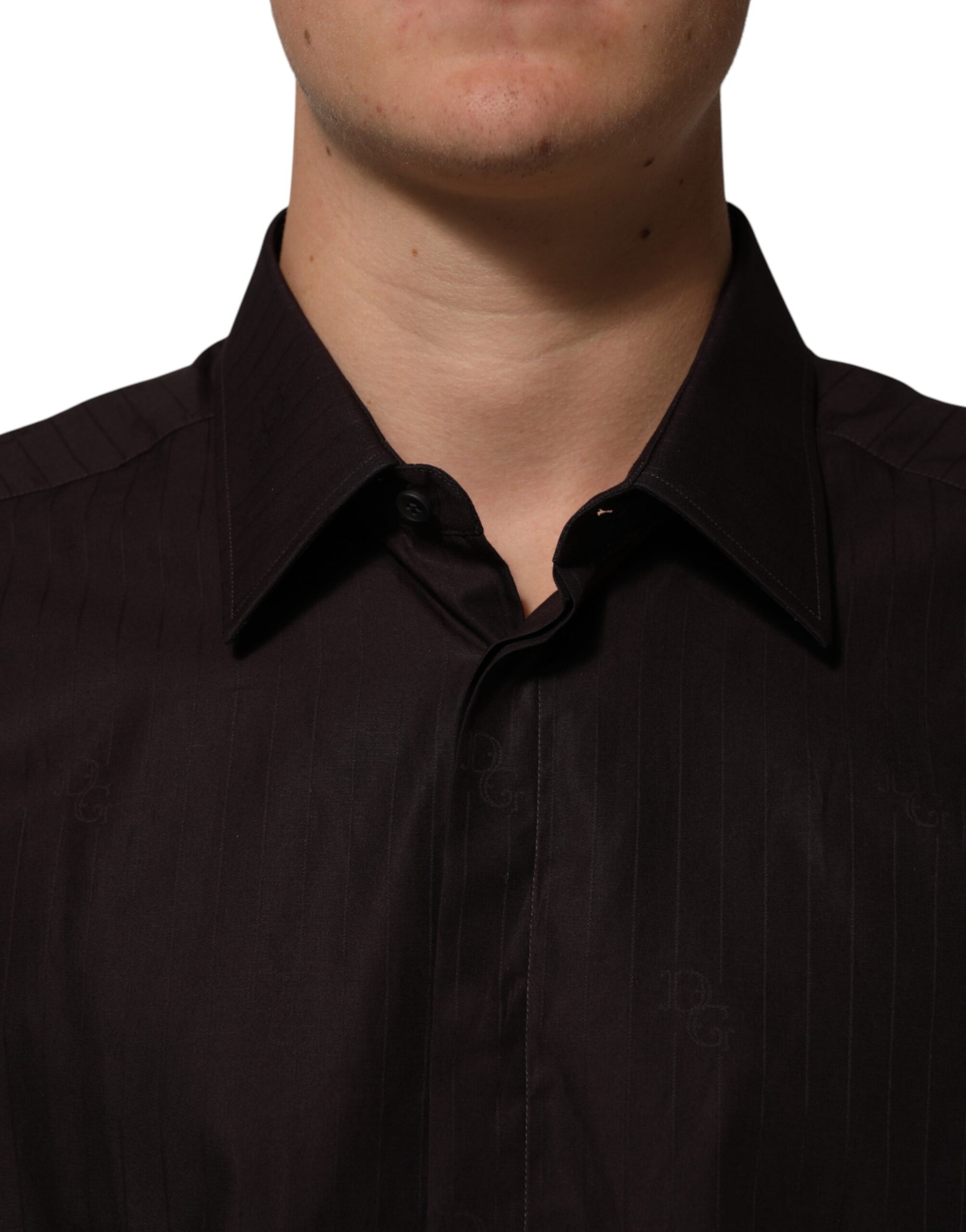 A mannequin wearing a brown cotton long-sleeved shirt