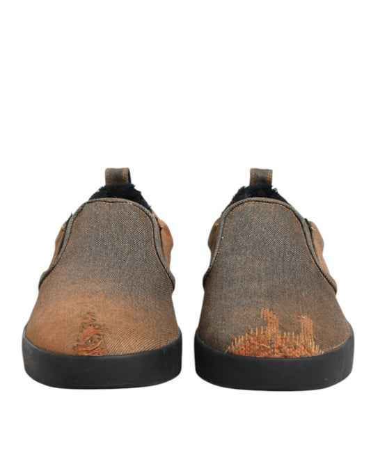 Pair of brown shoes with black soles
