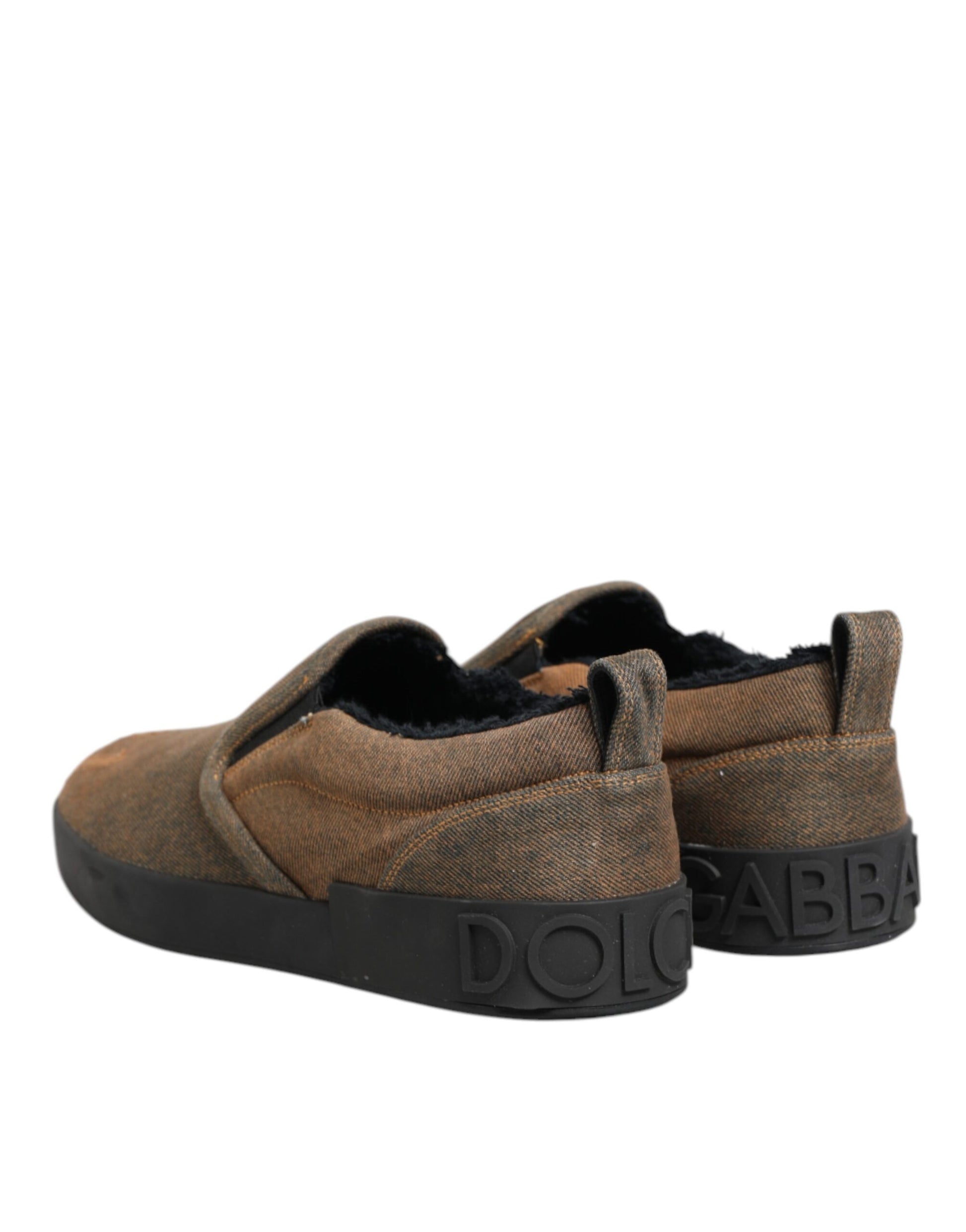 Pair of brown baby shoes with black soles