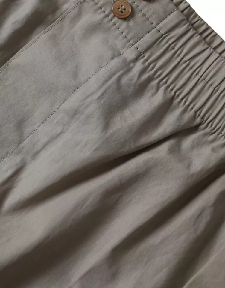 Tan cargo pants with buttoned pockets