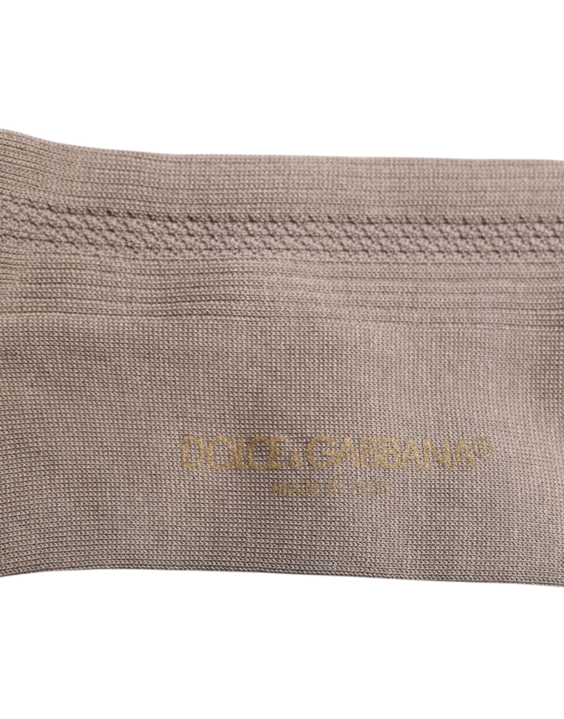 Brown cloth item with embroidered logo