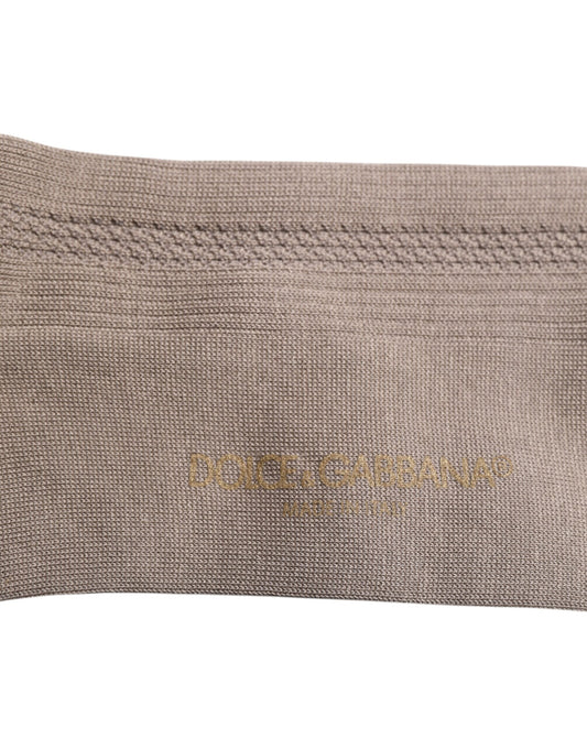 Brown cloth item with embroidered logo