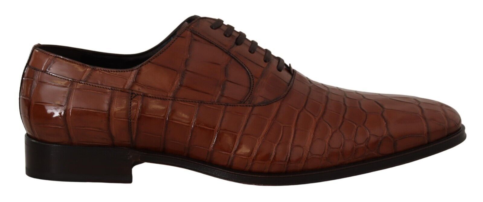 Brown leather dress shoe with laces and a small heel