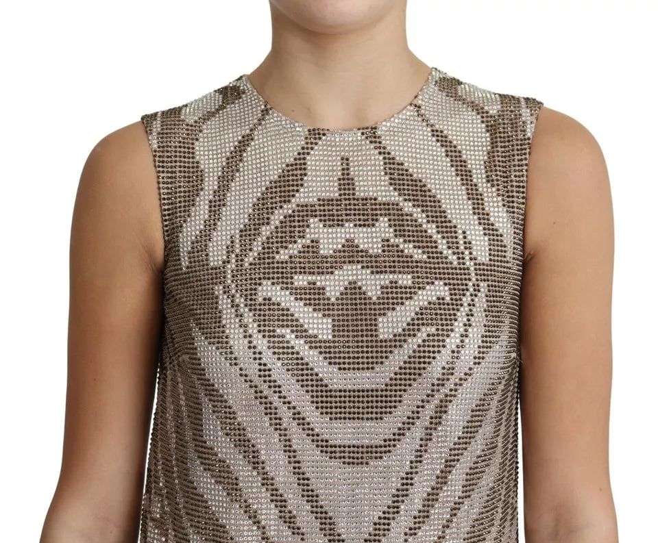 A sleeveless dress with a zebra print design and silver crystals