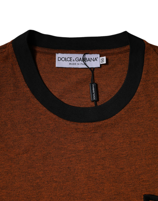 Red sweater with black collar and zipper tag