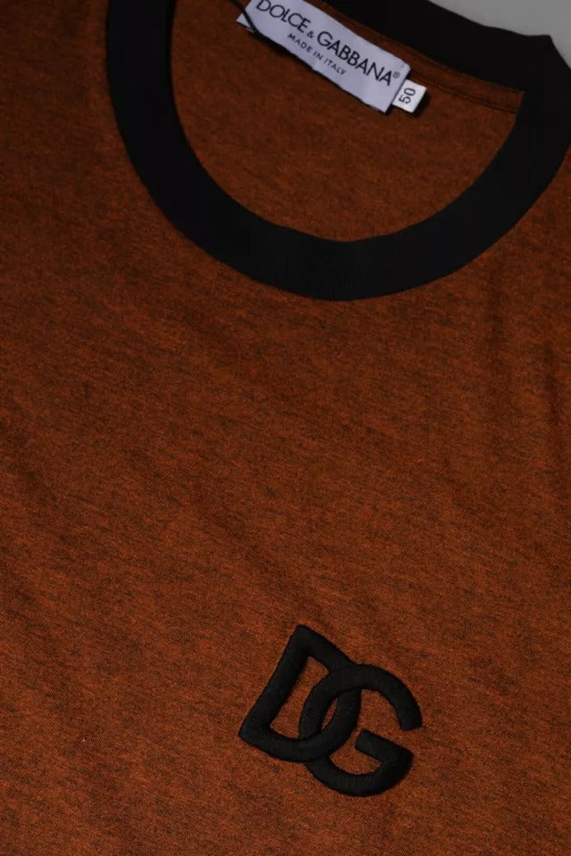 Red sweater with black collar and DC logo on front