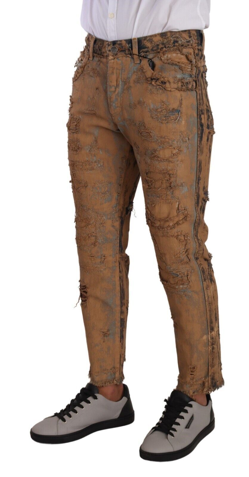Pair of distressed jeans with patches on legs