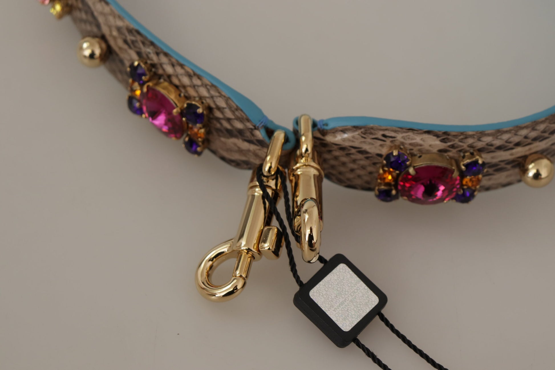 Gold hook on leather dog collar
