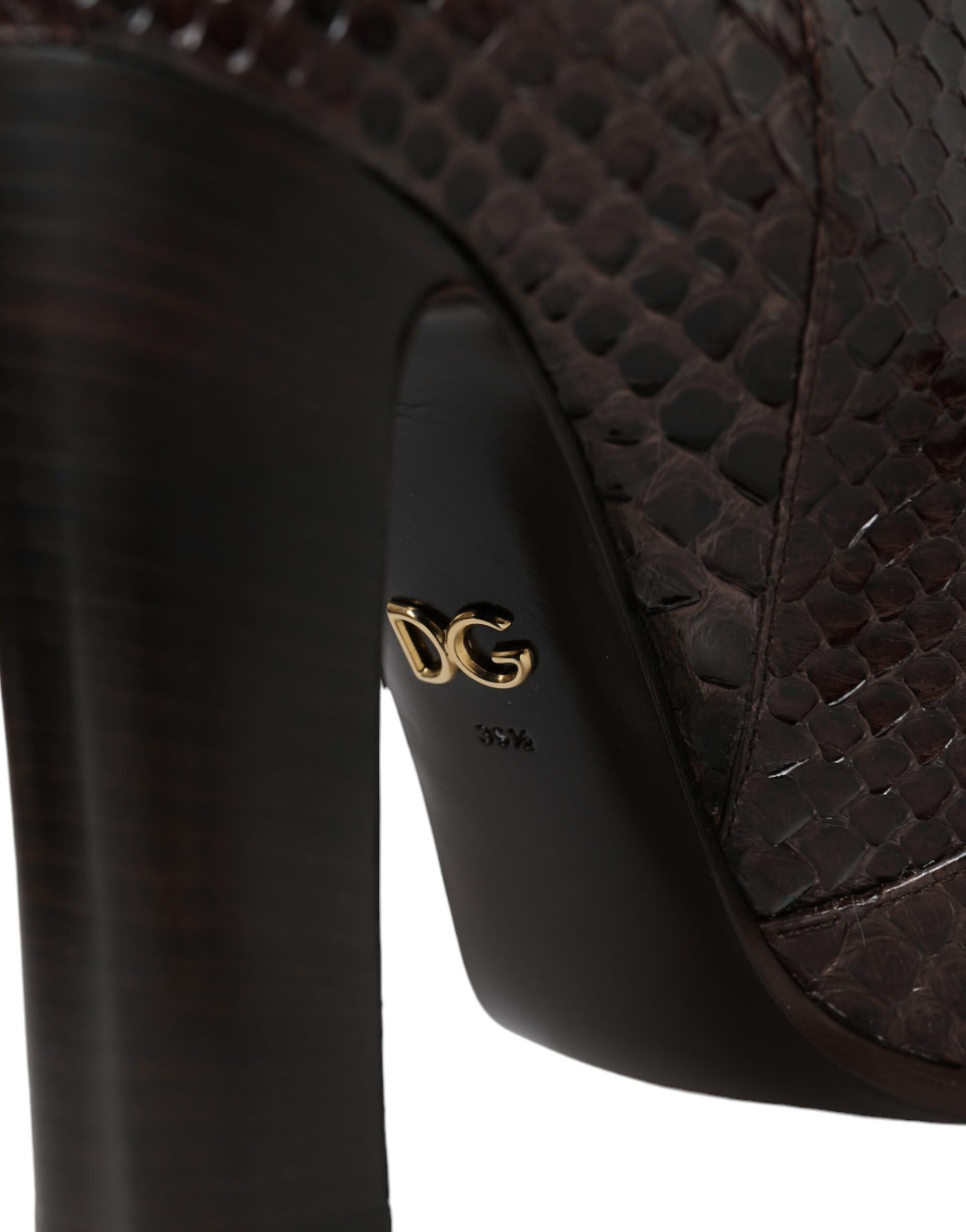High heel shoe with a brown snake skin texture