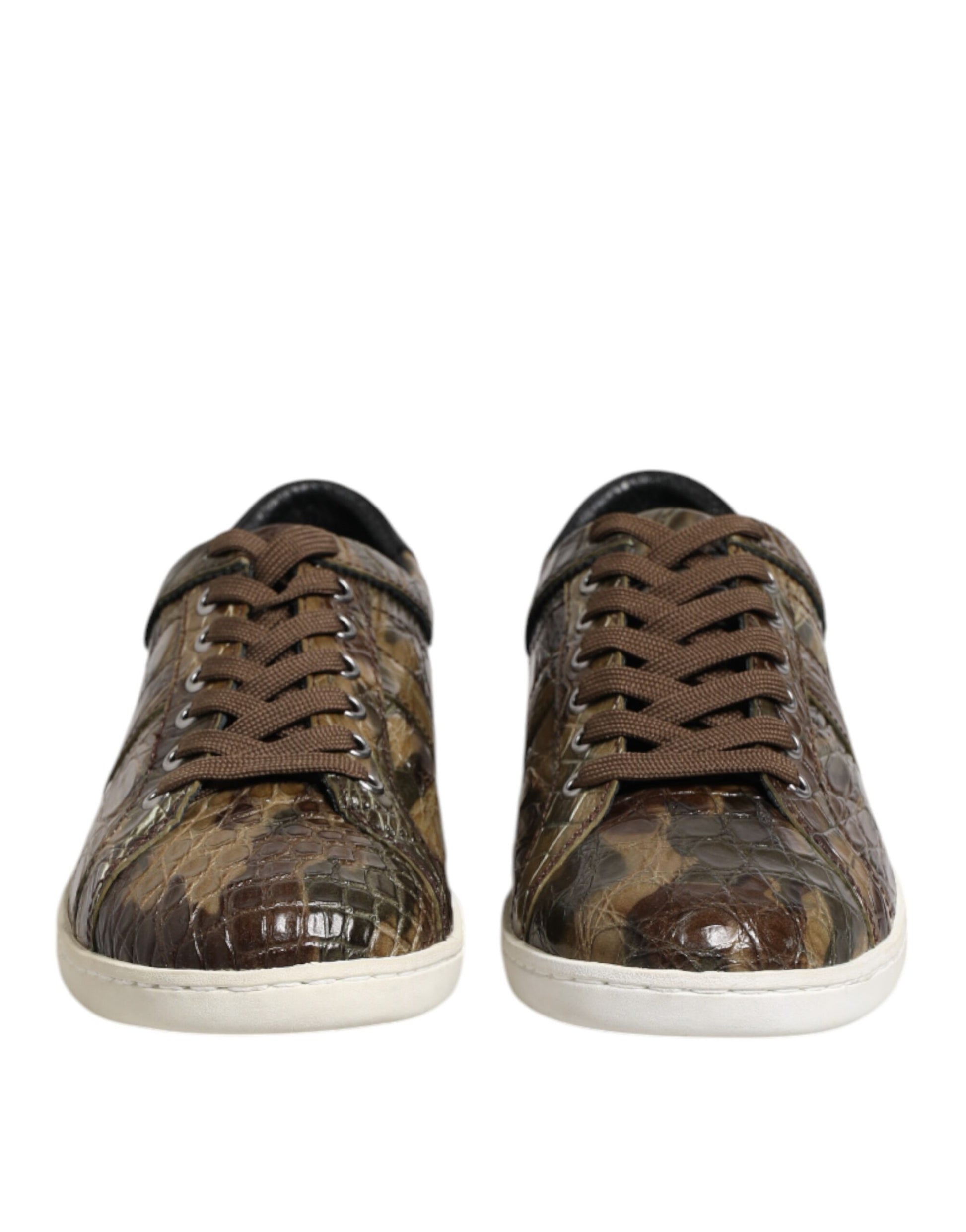 Pair of camouflage sneakers with brown laces