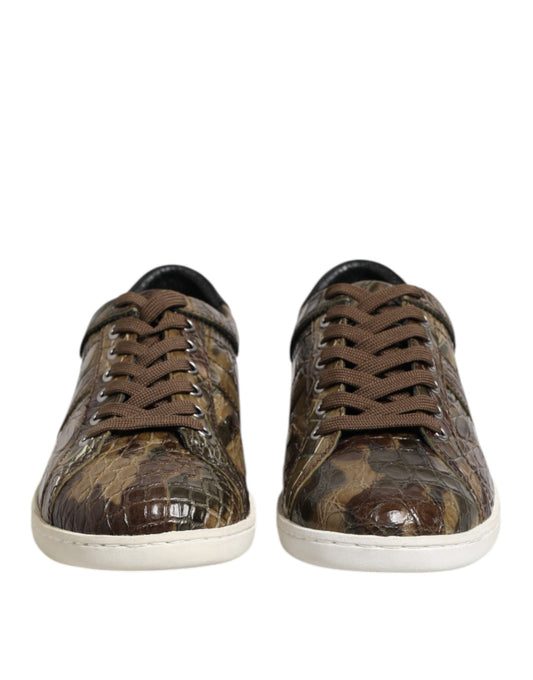 Pair of camouflage sneakers with brown laces