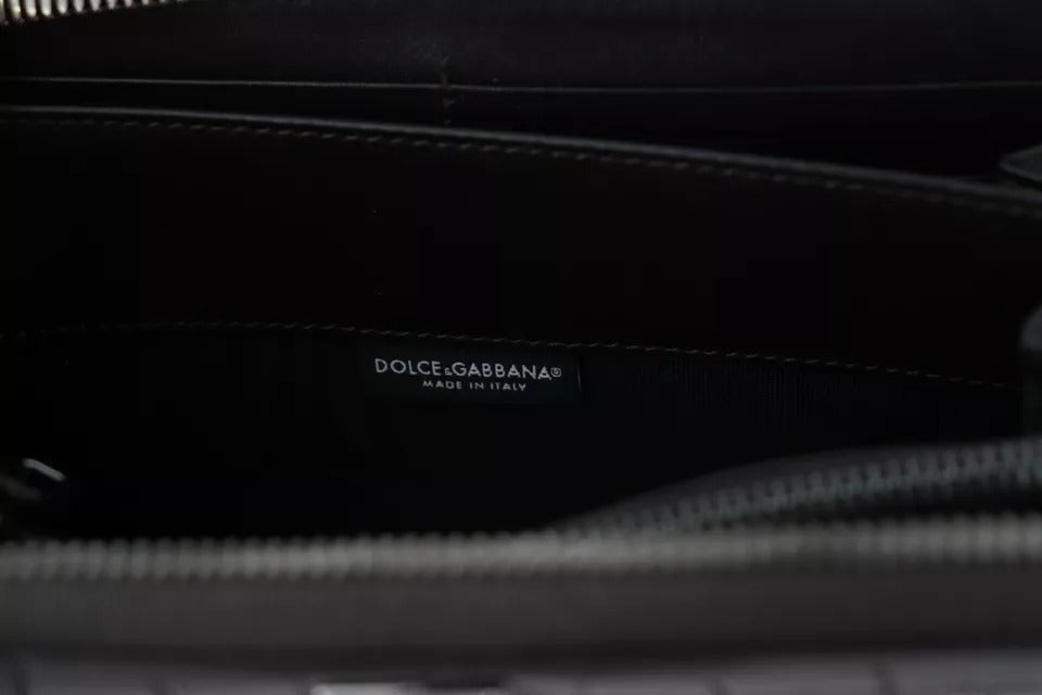 Black leather wallet with brand name on tag