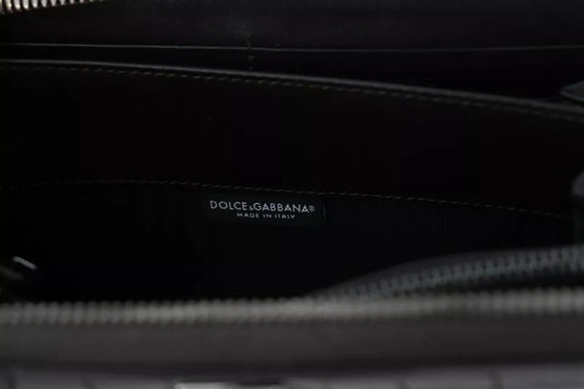 Black leather wallet with brand name on tag