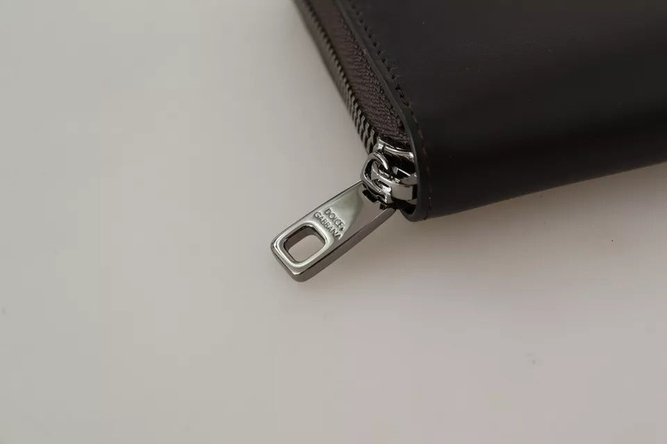 Black leather wallet with silver zipper pull