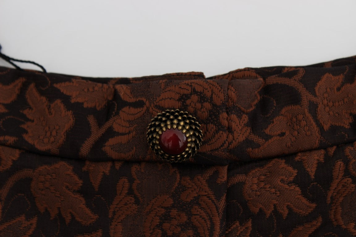 Decorative belt with floral pattern and a red button closure