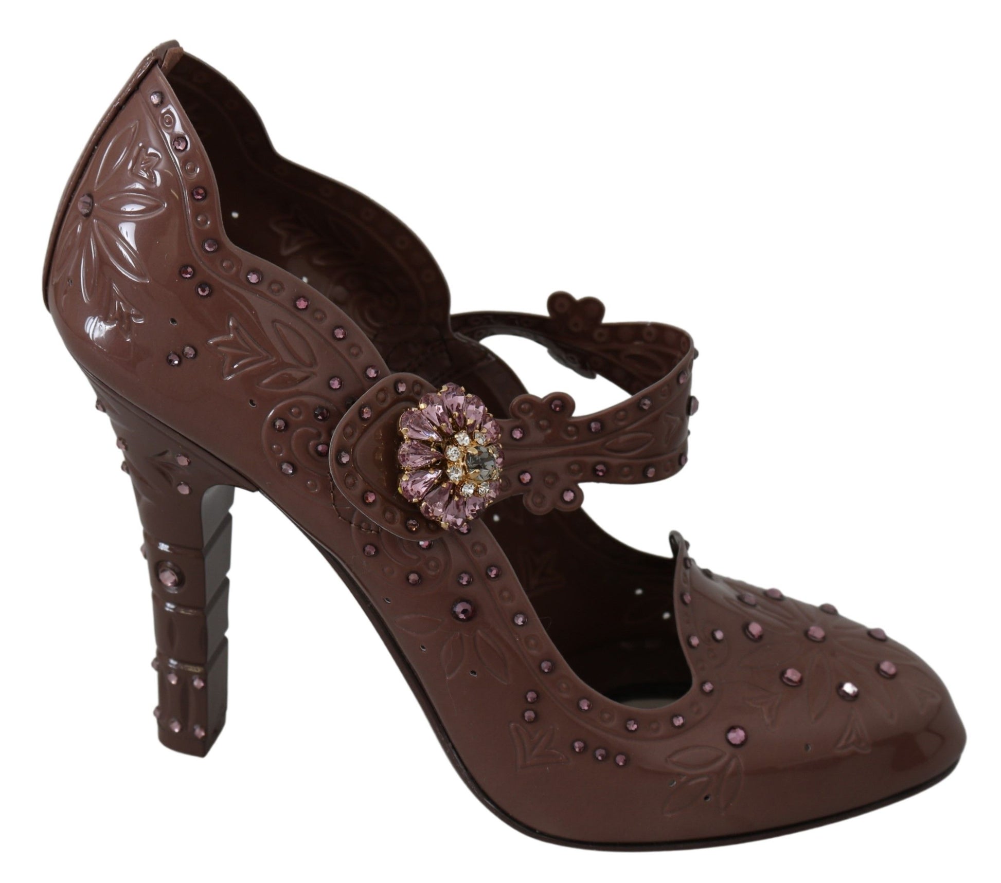 Brown high heel shoes with embellishments and a bow on top