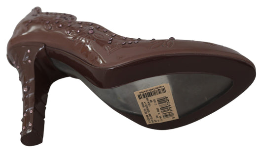 Chocolate brown high heel shoe with glittery accents and a tag on the insole