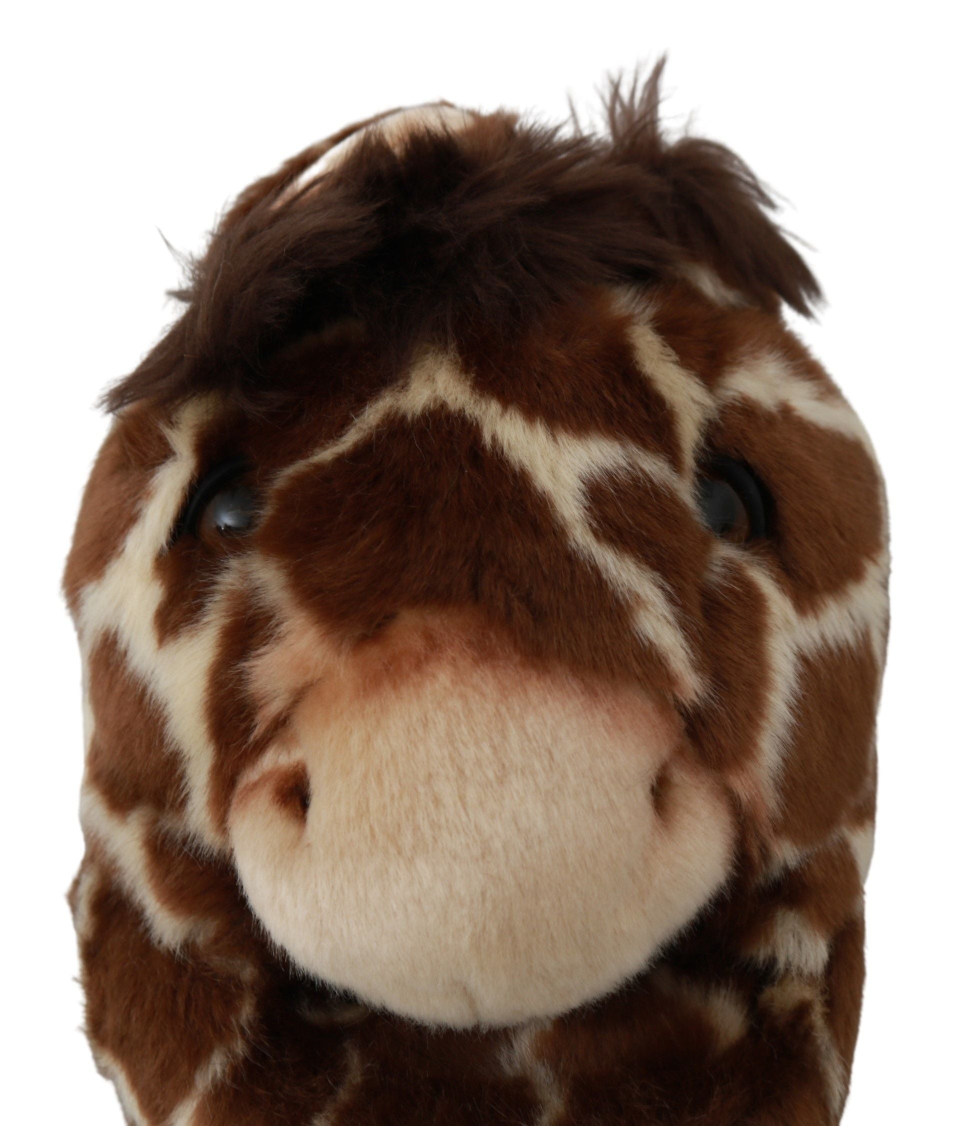 Stuffed toy giraffe with brown spots and a white nose