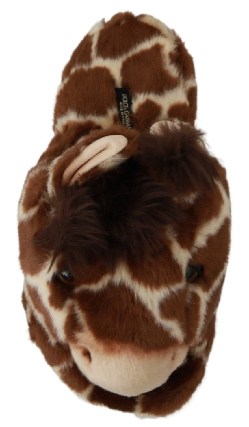Stuffed giraffe toy with brown spots and a white nose