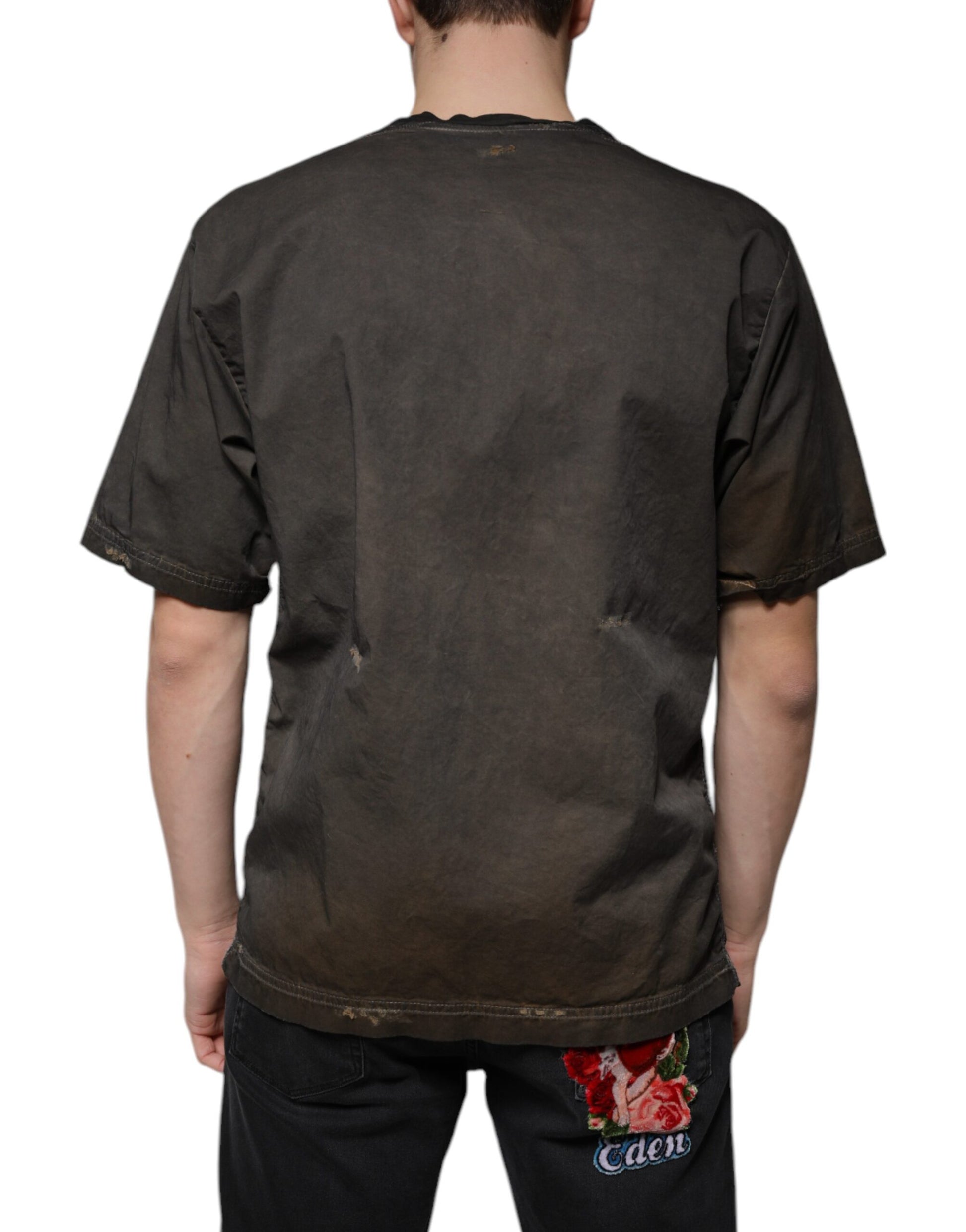 Man wearing dark t-shirt with logo on back