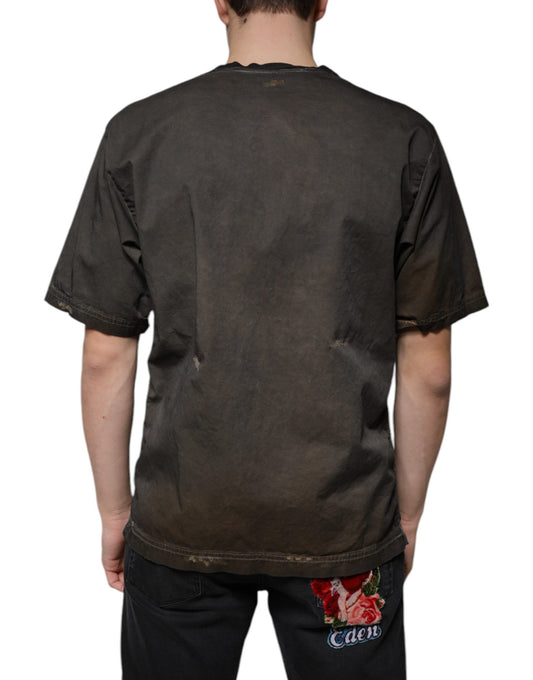 Man wearing dark t-shirt with logo on back