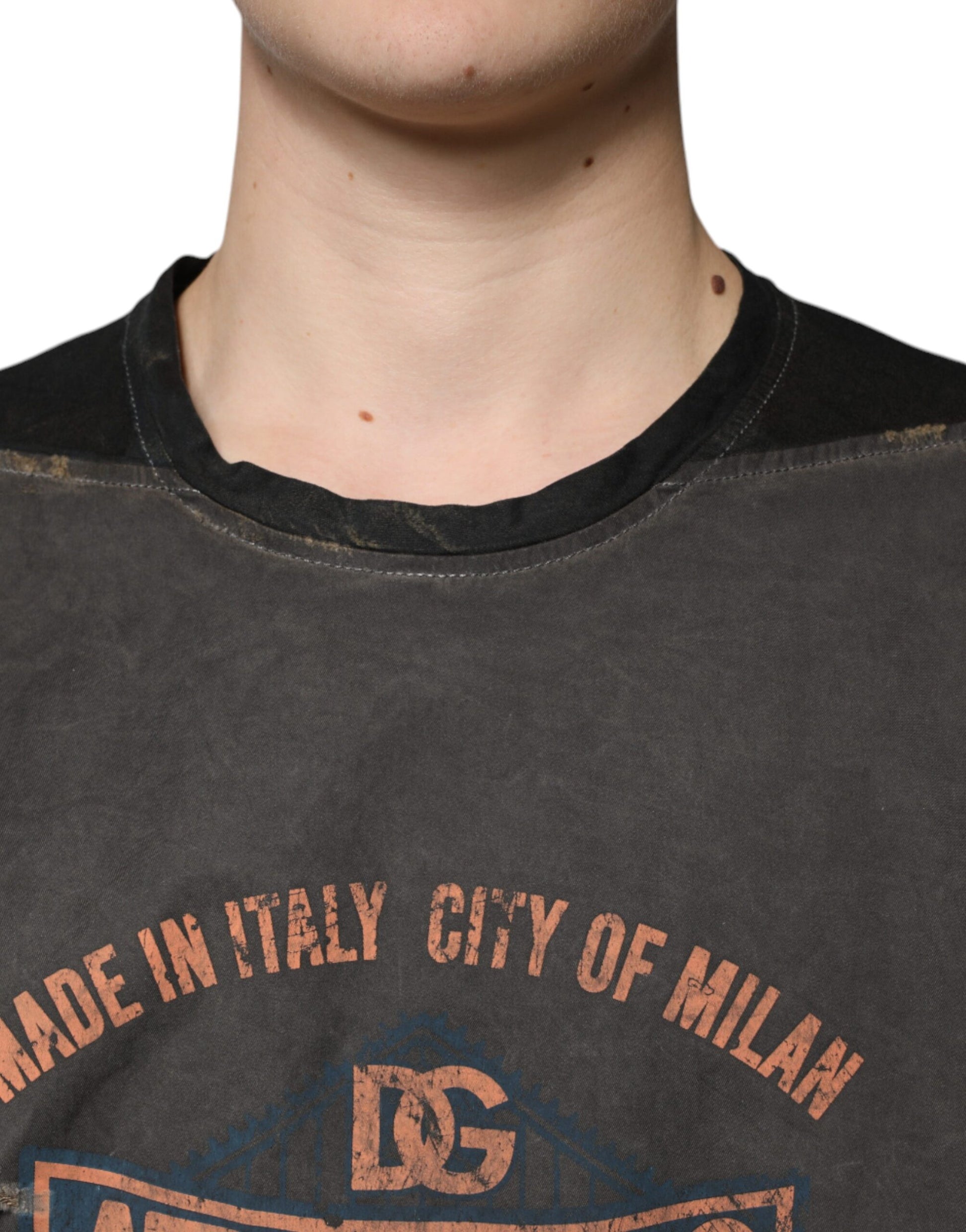 Man wearing black shirt with red lettering
