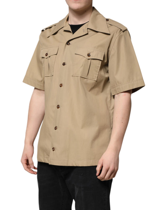 Man wearing tan shirt with buttons down front