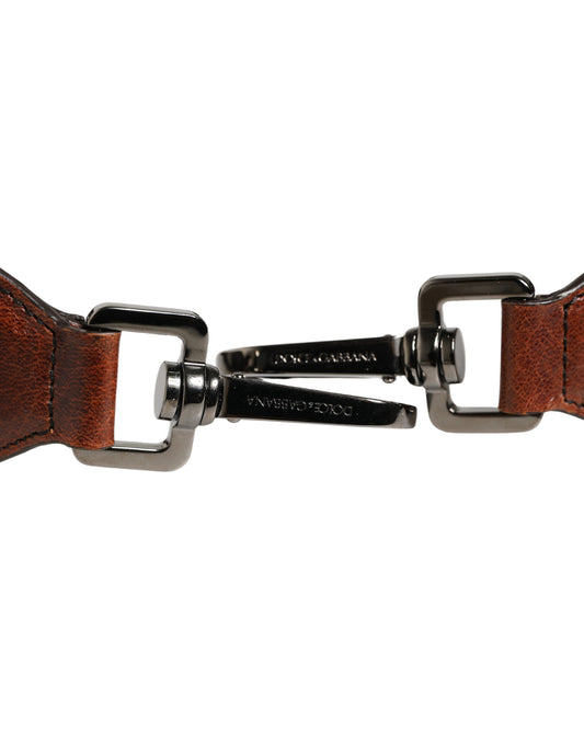 Brown leather belt with metal buckle