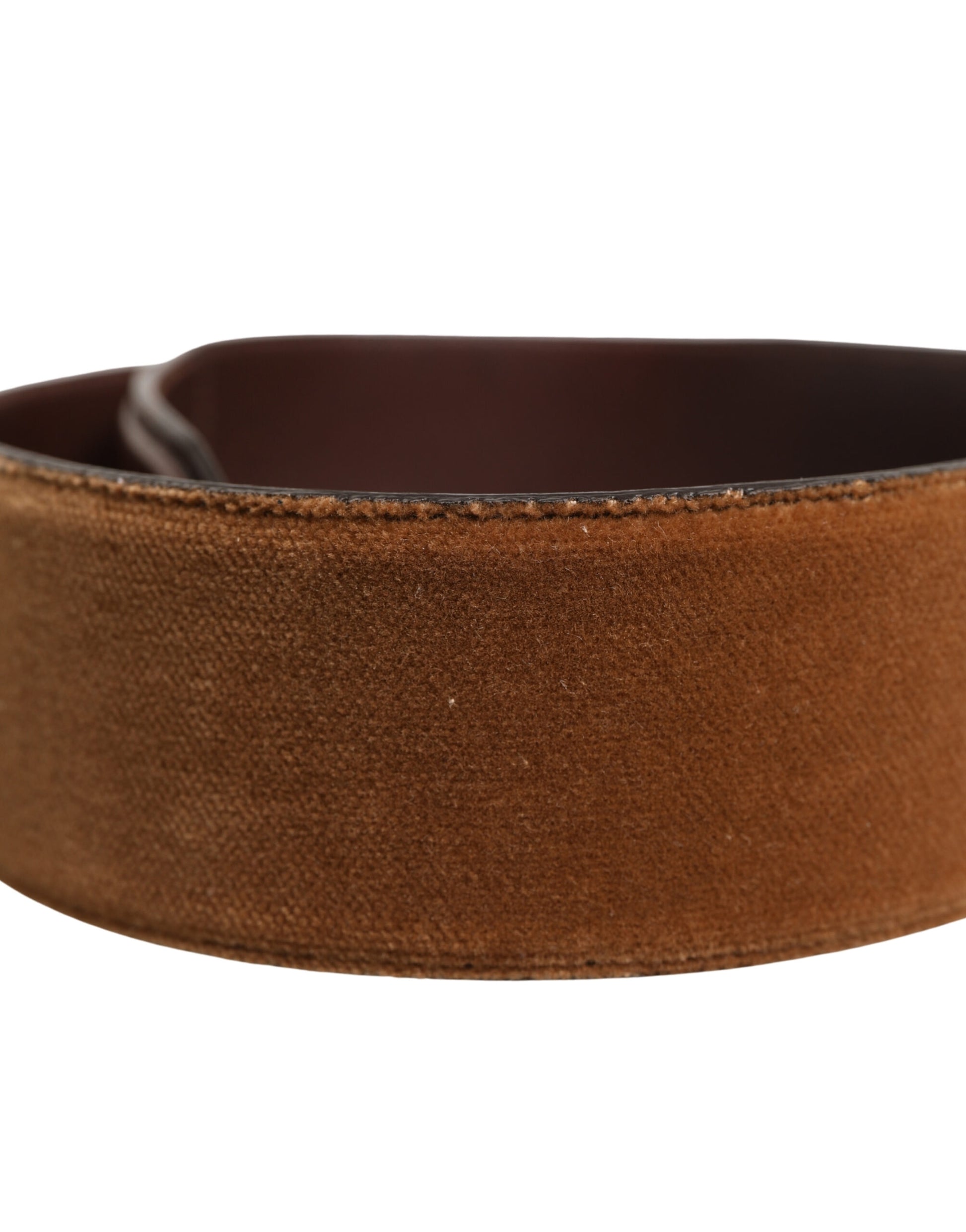 Brown leather belt with metal buckle