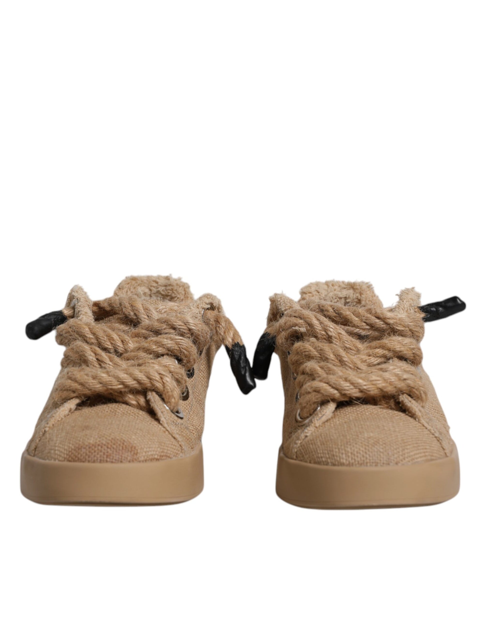 Pair of baby shoes with laces tied in a bow