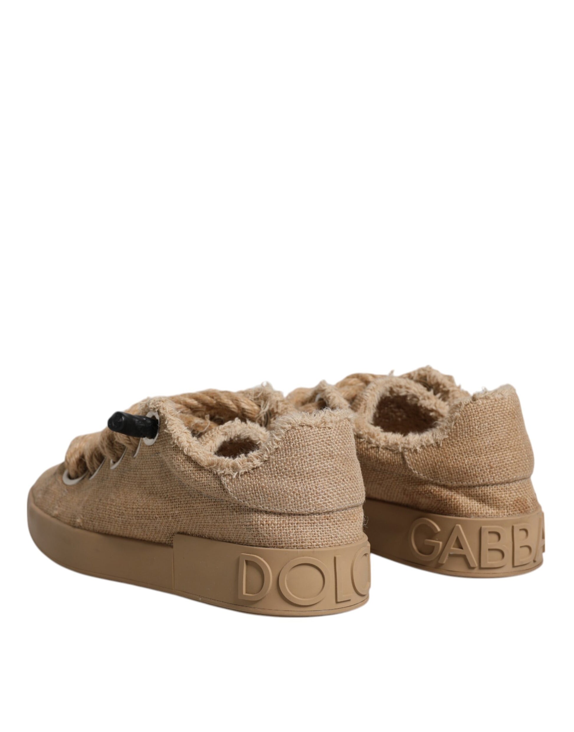 Tan baby shoe with black strap