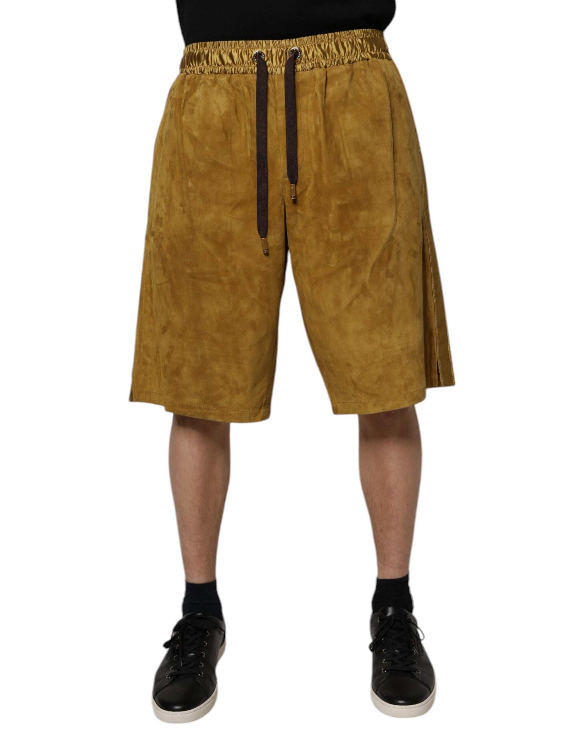 A pair of men's brown lambskin suede shorts with a drawstring waistband