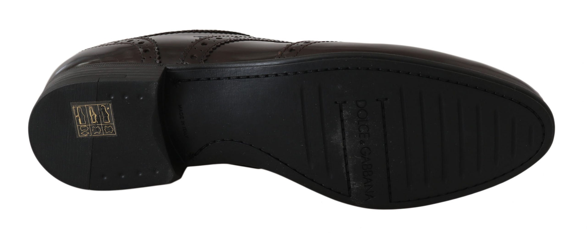 Black shoe with gold logo on side