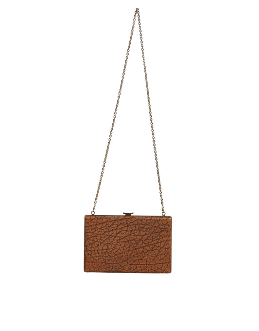Brown purse hanging from a chain