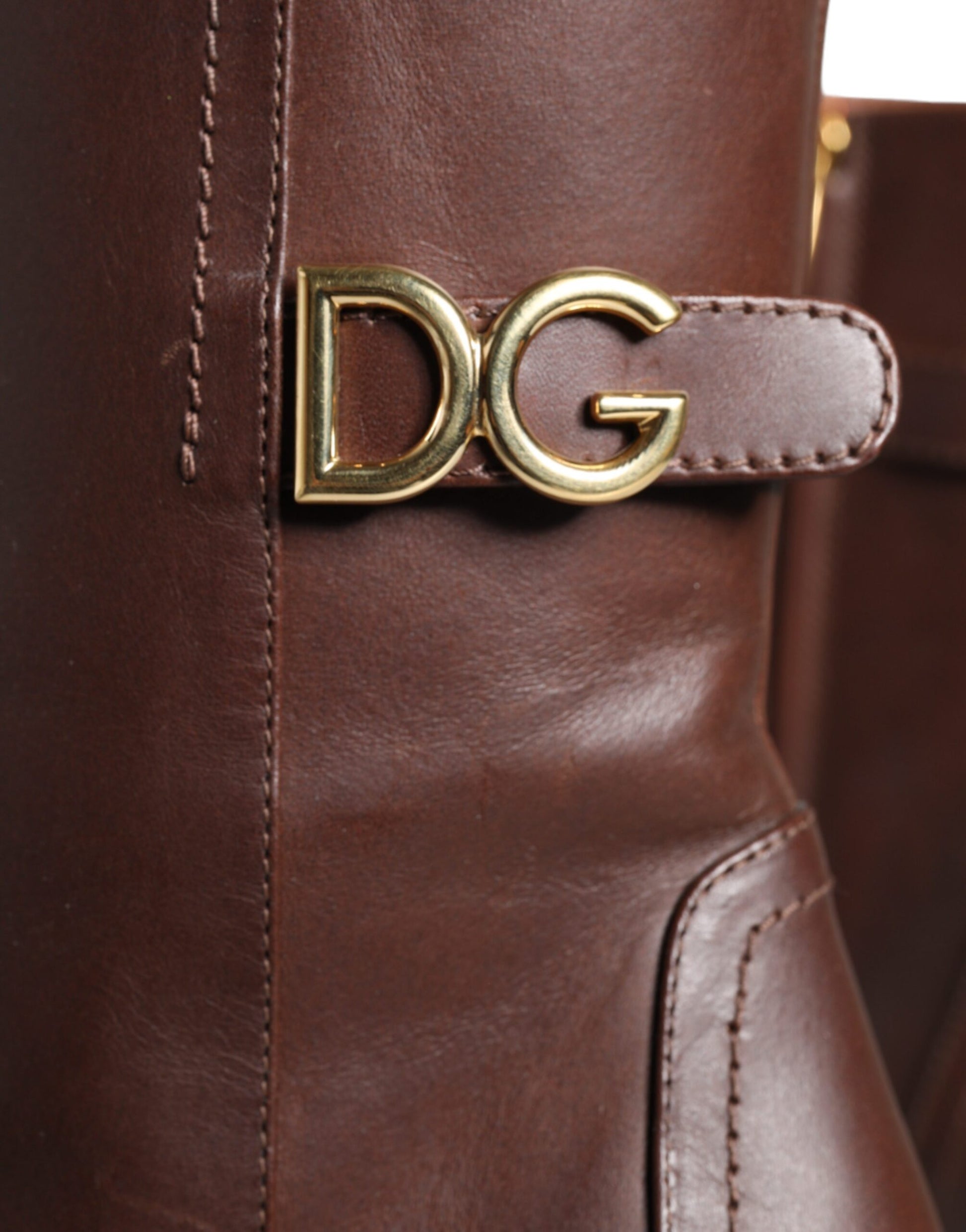 Brown leather boot with gold logo