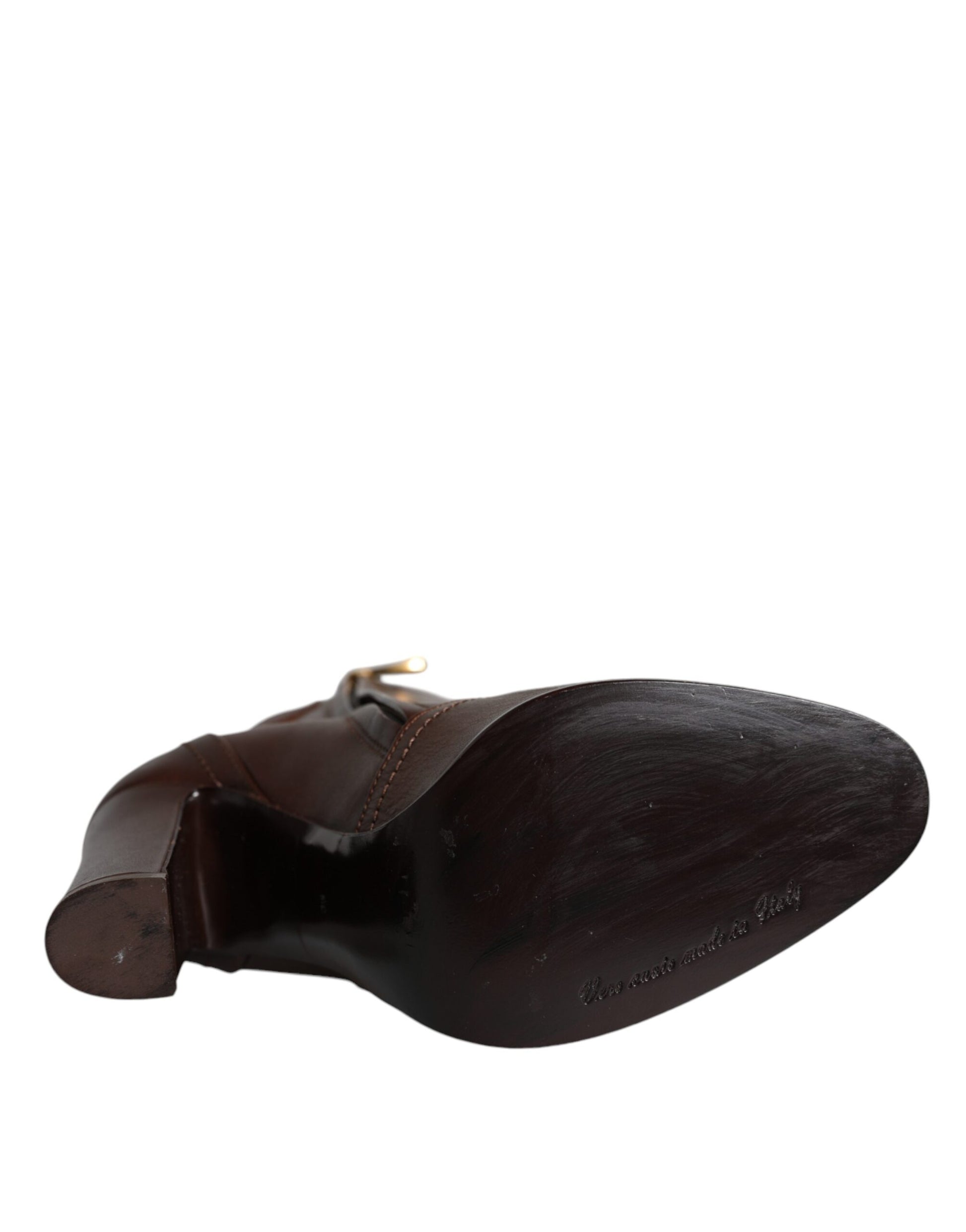 Brown leather shoe on white background