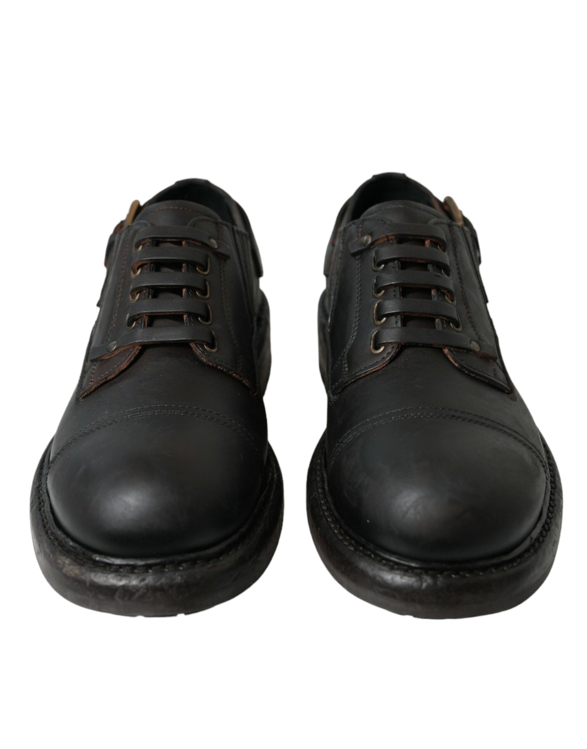 Pair of black leather shoes with laces