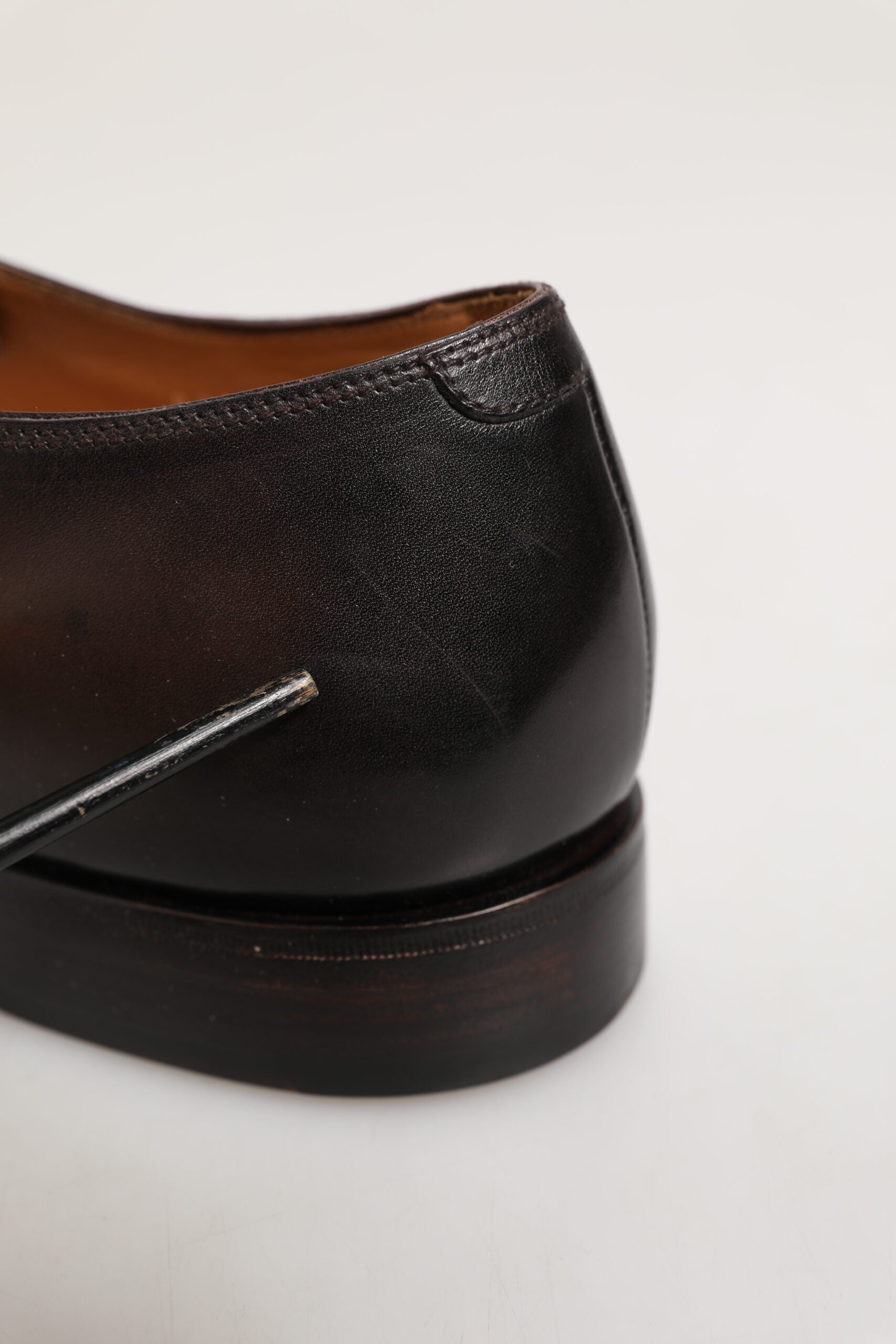 A pair of brown leather lace up dress shoes by Dolce & Gabbana