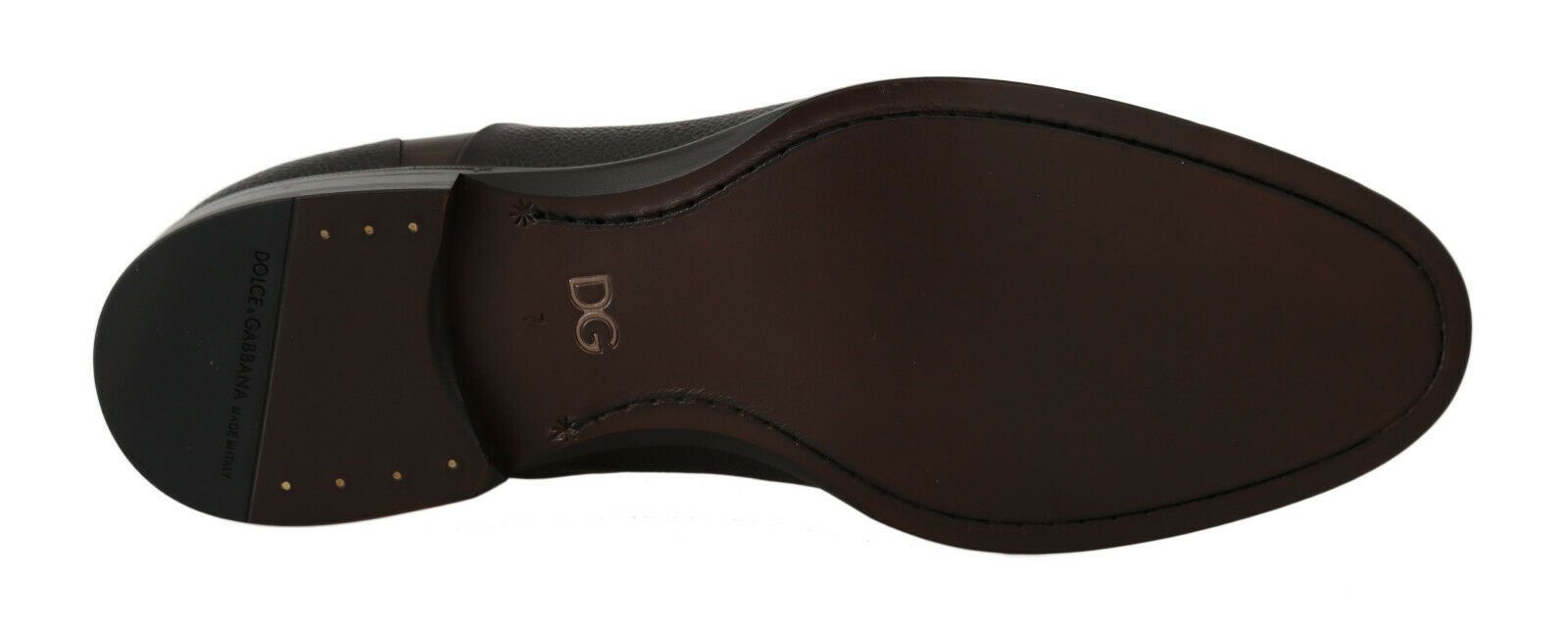 Pair of black dress shoes with laces and a small heel