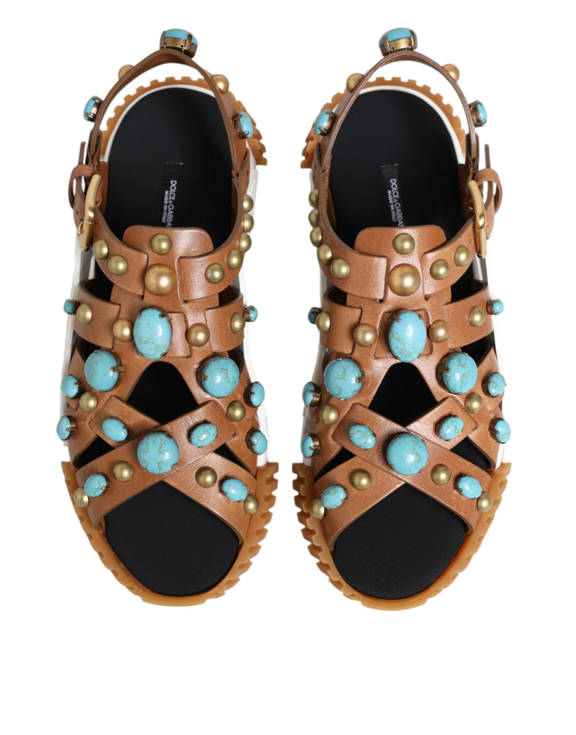 Pair of brown sandals with turquoise stones