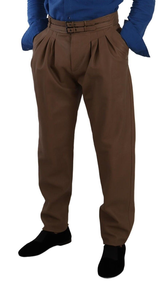 Man wearing brown pants and black shoes