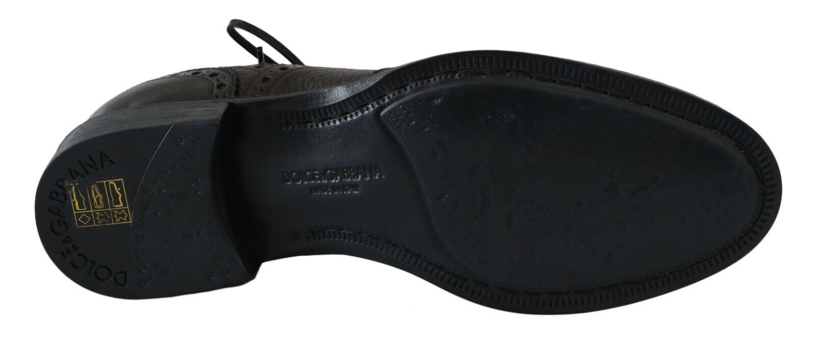Black shoe with yellow logo on side