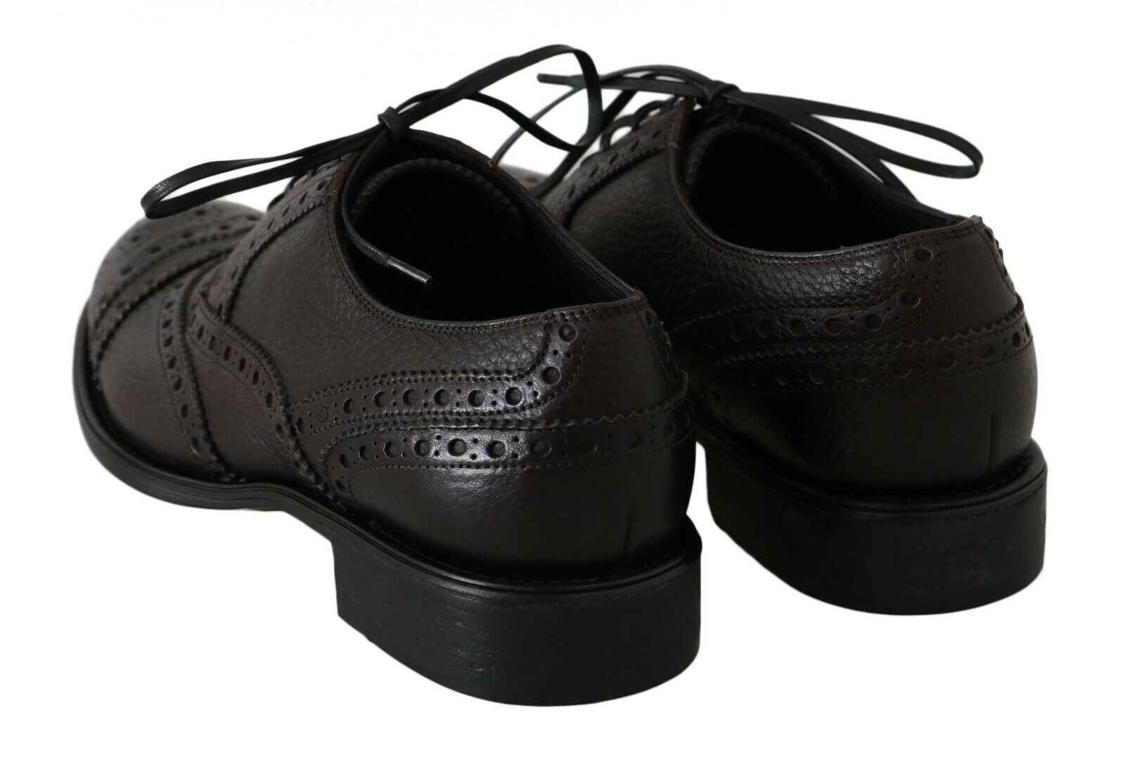 Pair of black dress shoes with laces and a small heel