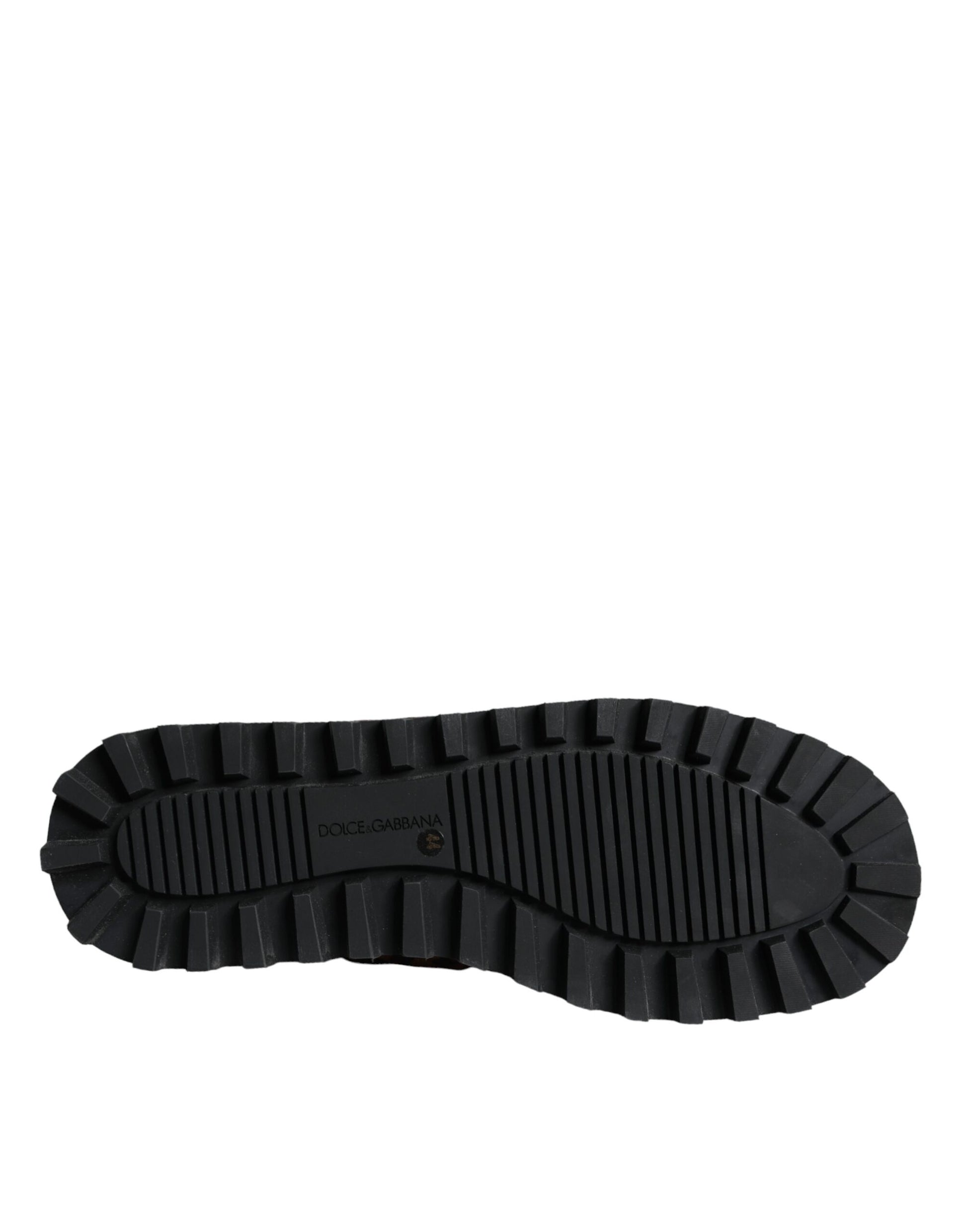 Black rubber boot with deep treads