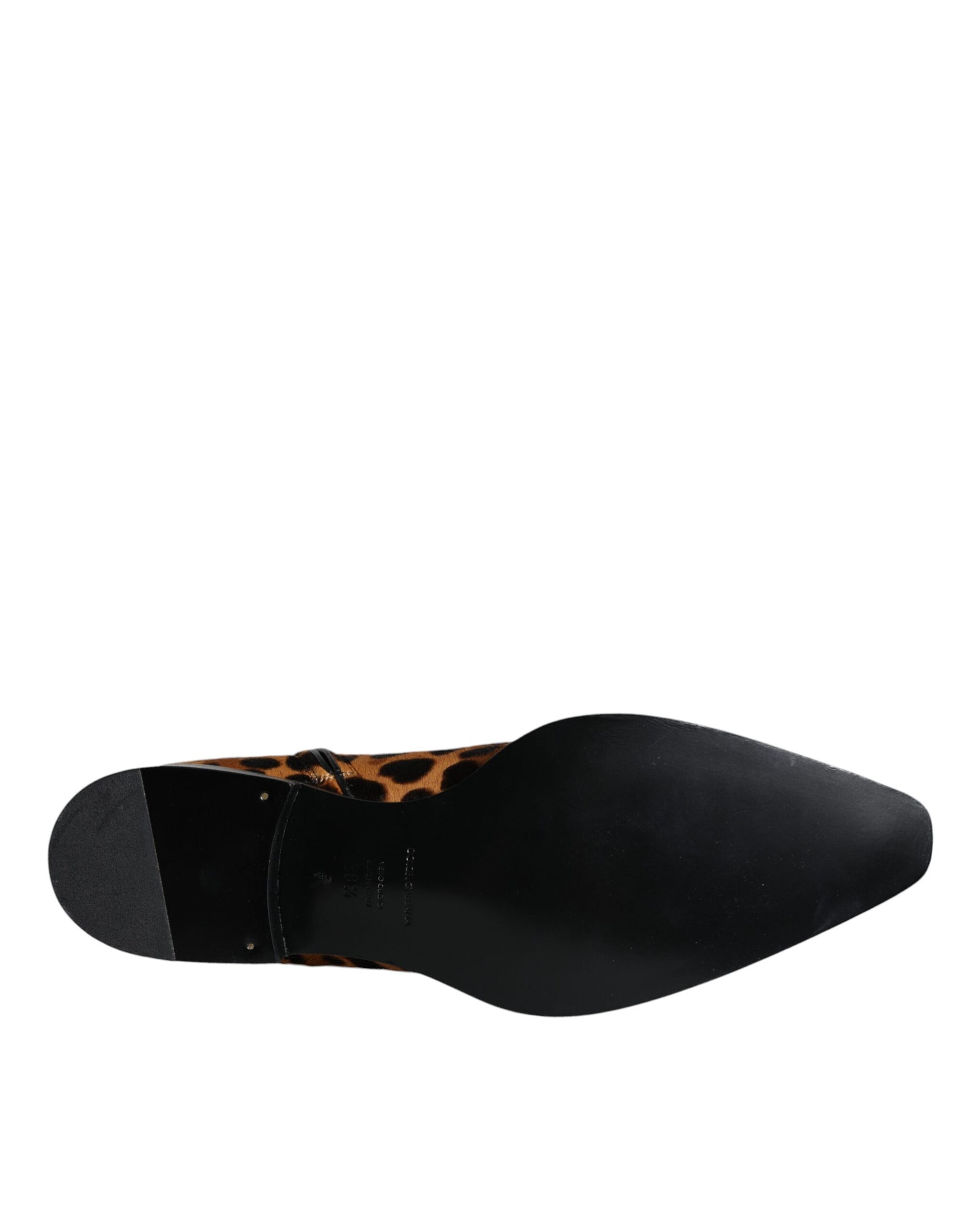 Black shoe with brown spots