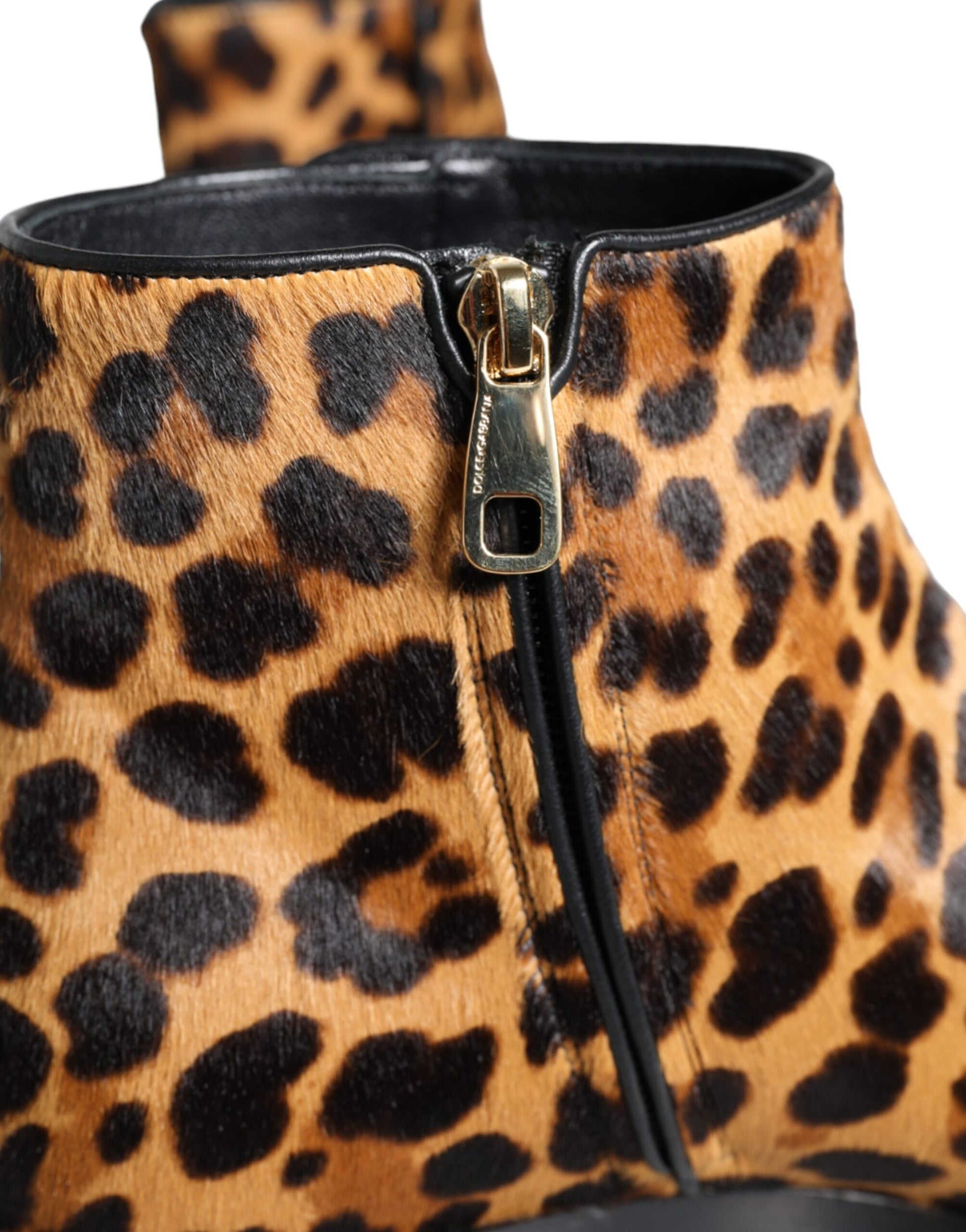Leopard print boot with zipper closure