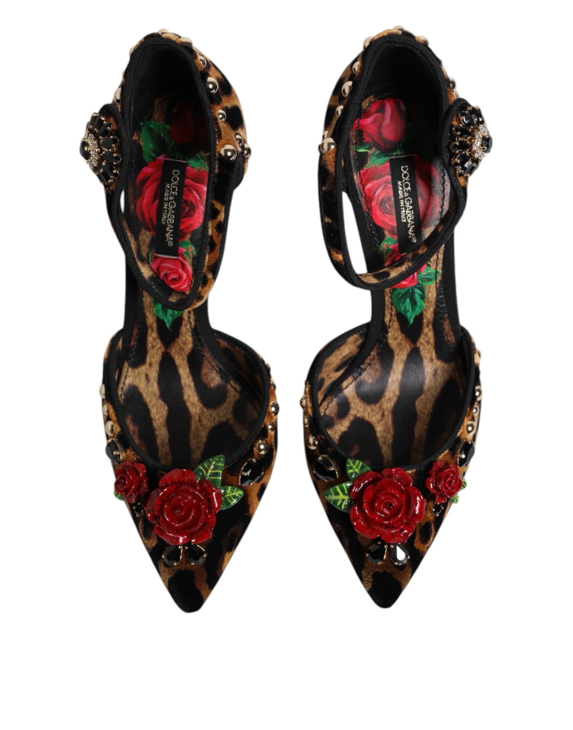 Pair of high heel shoes with floral embellishments