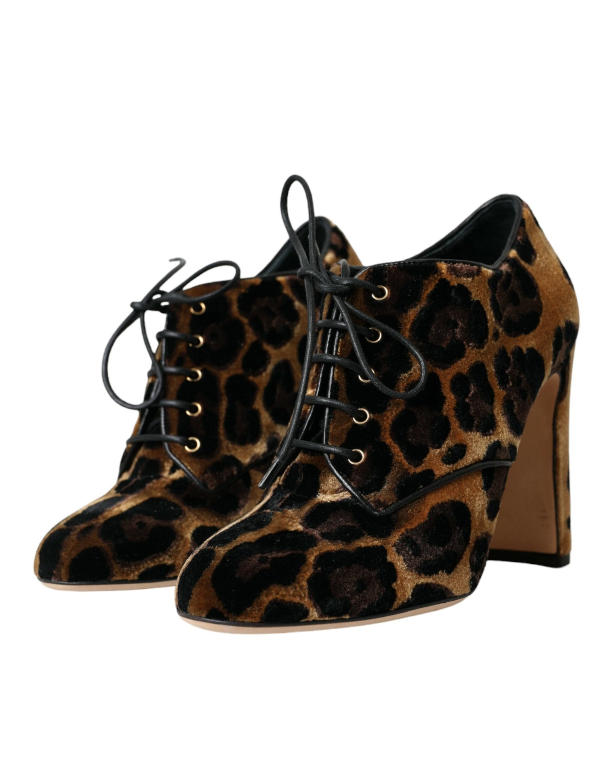 Pair of women's boots with animal print design and lace-up detailing