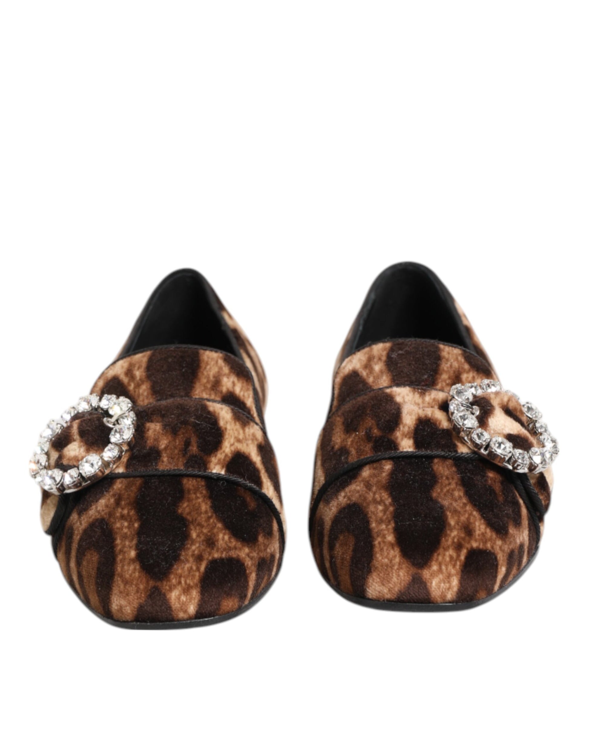 Pair of brown and white women's shoes with embellishments